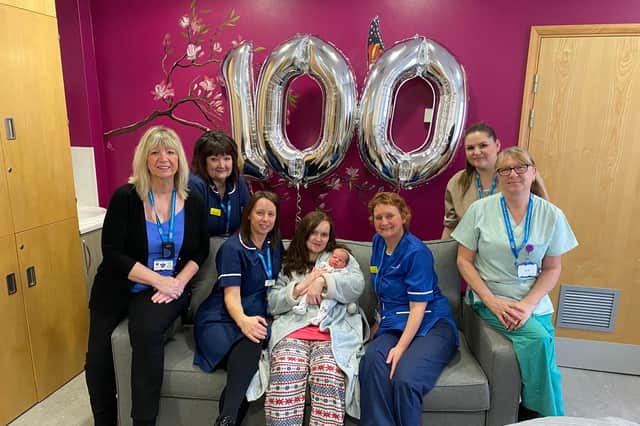Head of Midwifery, Sheila Ford and birthing centre manager, Jacqui Ramshaw are joined by members of the midwifery team and new mam Shannon Bain with 100th baby, Renesmae.