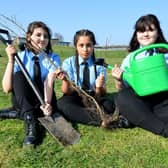 From left: Katie Papling, Sophie Middleton and Chloe Savage were among the Dene Academy students to plant new trees.