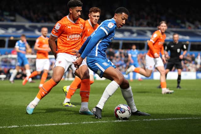 BIRMINGHAM, ENGLAND - APRIL 22: Jobe Bellingham of Birmingham City is challenged by Jordan Lawrence-Gabriel of Blackpool during the Sky Bet Championship between Birmingham City and Blackpool at St Andrews (stadium) on April 22, 2023 in Birmingham, England. (Photo by Cameron Smith/Getty Images)