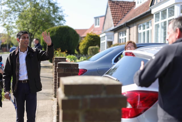 Rishi Sunak waving goodbye to residents after a day campaigning on the streets of Tunstall.

Picture by Andrew Parsons CCHQ / Parsons Media