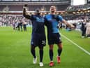 Adebayo Akinfenwa and Sam Vokes of Wycombe Wanderers celebrate. (Photo by Marc Atkins/Getty Images).