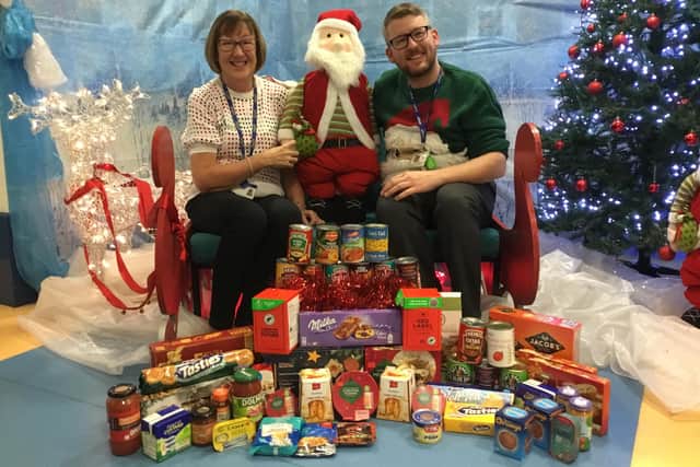 Staff at Columbia Grange School with some of the donated items for Sunderland Community Soup Kitchen