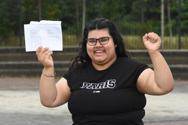 Kareena Jawanda, 16, celebrating her exam results. Kareena succeeded despite the disruption of contracting Covid "several times".