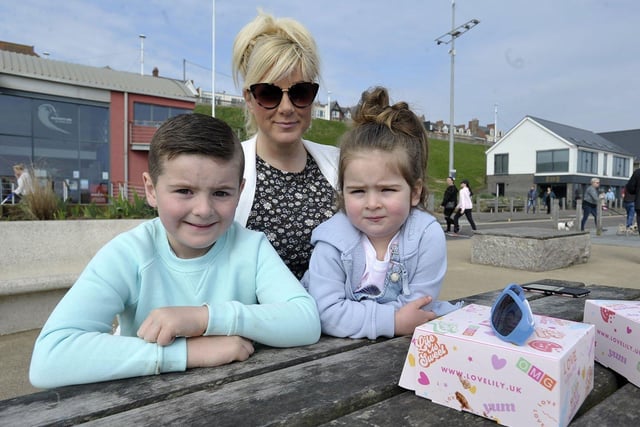 Jill Cook, 37, with her children Grayson O'Riordan, six, and Harlow O'Riordan, two, enjoying some tasty treats at Roker Beach.

Picture by FRANK REID