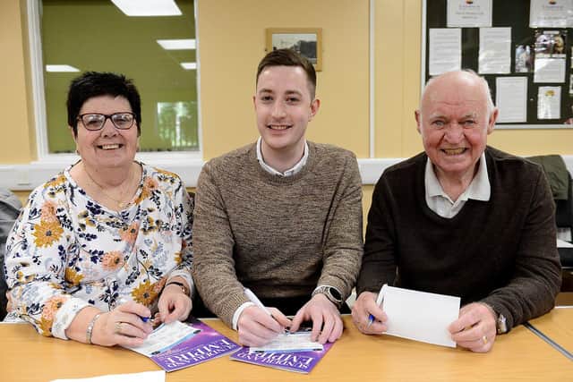 Elliot Carpenter (centre) from the Sunderland Empire playing musical bingo at the Sr Thomas Allen Centre with Poppy (75) and Alf (79) Jenner. Picture by FRANK REID