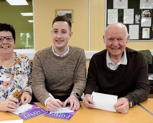 Elliot Carpenter (centre) from the Sunderland Empire playing musical bingo at the Sr Thomas Allen Centre with Poppy (75) and Alf (79) Jenner. Picture by FRANK REID