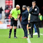 Lee Johnson in dialogue with referee Darren Drysdale