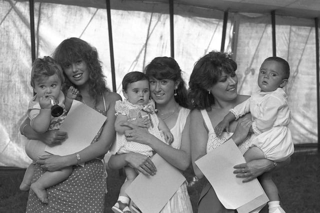 It's the 1983 Sunderland Carnival Bonny Baby Competition. Pictured are the mothers and the winning babies in the 7-12 months sections, Michael William Yates, Andrea Lane and Farouk Riaz.