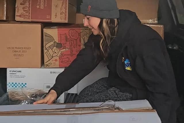 Kate Snowdon packs medical supplies into the car ready for her trip to Ukraine.