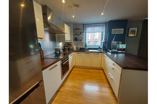 The fitted kitchen offers good space and equipment.