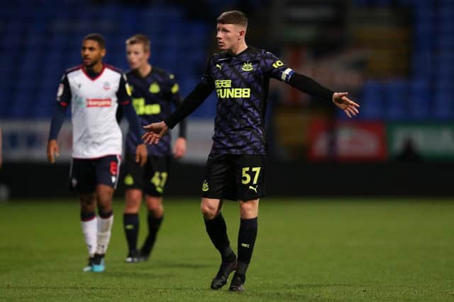 Elliot Anderson of Newcastle United U21's reacts during the EFL Trophy match between Bolton Wanderers and Newcastle United U21 at University of Bolton Stadium on November 17, 2020 in Bolton, England. Sporting stadiums around the UK remain under strict restrictions due to the Coronavirus Pandemic as Government social distancing laws prohibit fans inside venues resulting in games being played behind closed doors. (Photo by Charlotte Tattersall/Getty Images)