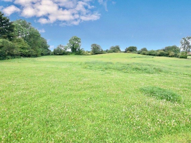 The property is set in about six acres of land.