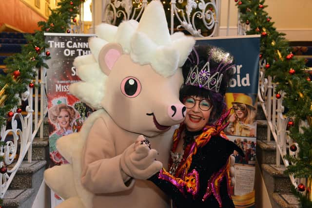 Sunderland Empire Theatre receive autism acceptance award. North East Autism Society mascot and Wicked Queen Su Pollard.