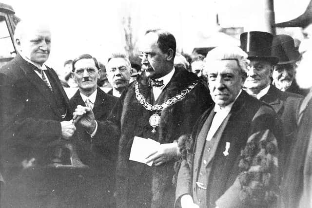 Dr C.F. Brears (left), the last Chairman of Southwick's Council hands over the seal of the Council to the Mayor of Sunderland  Alderman Cairns.