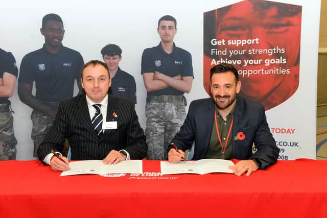 Military Preparation College Chief Executive Officer Huw Lewis and the Foundation of Light's Managing Director Jamie Wright signing the Memorandum of Understanding.