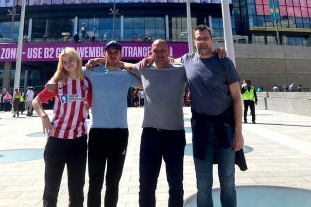 Kim, right, with fellow Black Cats fans Anders (second right), Anders' daughter Mathilde and son Mathias, from Denmark outside of Wembley.