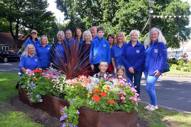 Washington in Bloom volunteers show off their hard work, as Washington Village is shortlisted in the Britain in Bloom awards.