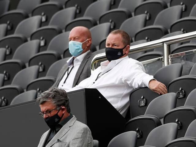 Newcastle United's English owner Mike Ashley (R) watches the English Premier League football match between Newcastle United and Brighton and Hove Albion at St James' Park in Newcastle upon Tyne, north-east England on September 20, 2020.