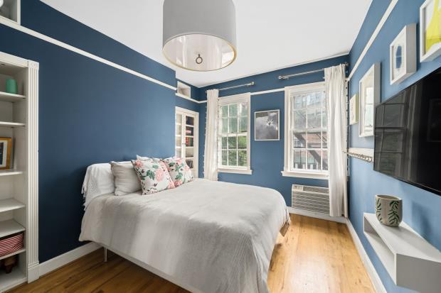 The five-bedroom property is currently configured as a three-bedroom upper duplex and a two-bedroom lower duplex.