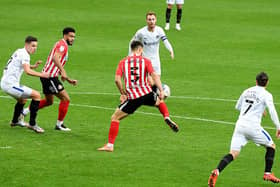 Bailey Wright in action for Sunderland against Portsmouth.