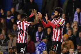 Ellis Simms of Sunderland (R) celebrates with teammate Amad Diallo after scoring their side's first goal during the Sky Bet Championship between Birmingham City and Sunderland at St Andrew's.
