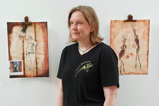 Kim McDermottroe with some of her images.