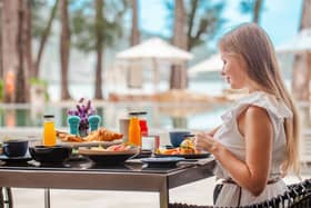 Enjoy the food and stop when you feel satisfied. Photo posed by model