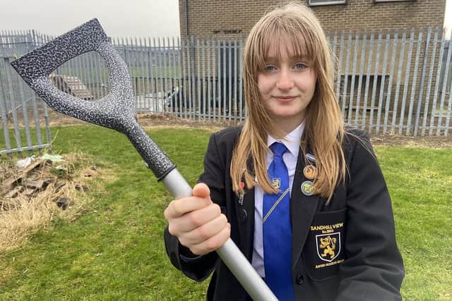 Darcie Peters, 14,  believes growing your own food makes people less likely to waste it.

Picture by FRANK REID