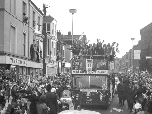 The open top bus in Vine Place. Fans even used the roof of shops and pubs to get a view.