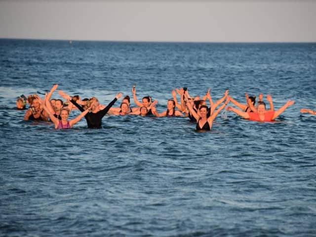 Members of the Wild Sea Women group enjoy their last North Sea dip together before the new rules capped the number of people allowed to socialise at six.