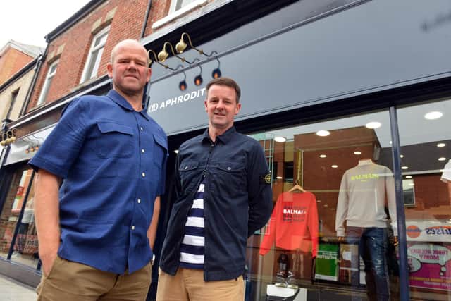 Aphrodite, owned by brothers, from left, Duncan and Andy McKenzie, is also reopening its Vine Place store on Monday, June 15.