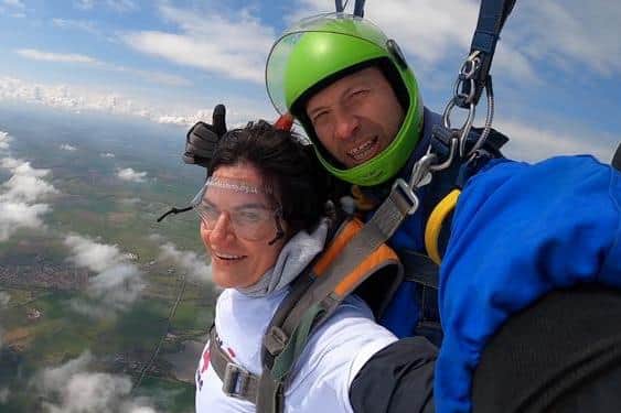 Janine Brown, pictured, carried out the sky dive to help raise money for a national suicide prevention charity.