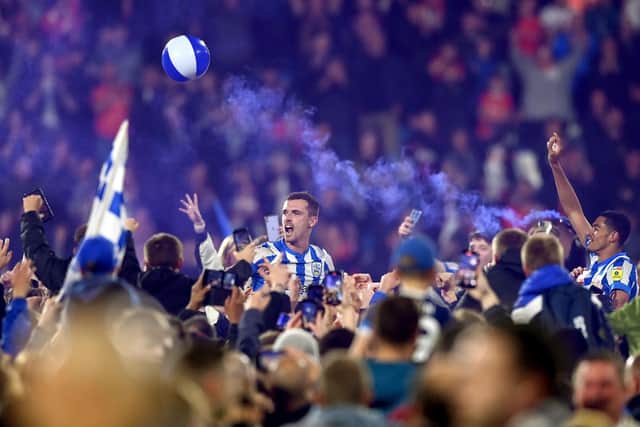 HUDDERSFIELD, ENGLAND - MAY 16: Harry Toffolo (C) of Huddersfield Town celebrates winning the Sky Bet Championship Play-Off Semi Final 2nd Leg match between Huddersfield Town1 and Luton Town  at John Smith's Stadium on May 16, 2022 in Huddersfield, England. (Photo by Gareth Copley/Getty Images)