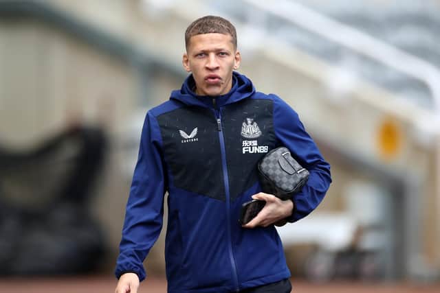 NEWCASTLE UPON TYNE, ENGLAND - MARCH 05: Dwight Gayle of Newcastle United arrives at the stadium prior to the Premier League match between Newcastle United and Brighton & Hove Albion at St. James Park on March 05, 2022 in Newcastle upon Tyne, England. (Photo by Ian MacNicol/Getty Images)