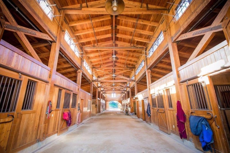 As well as this "magnificent oversized 11-stall barn", other highlights include polished tennis facilities, a swimming pool, gym, large wine room and helipad.