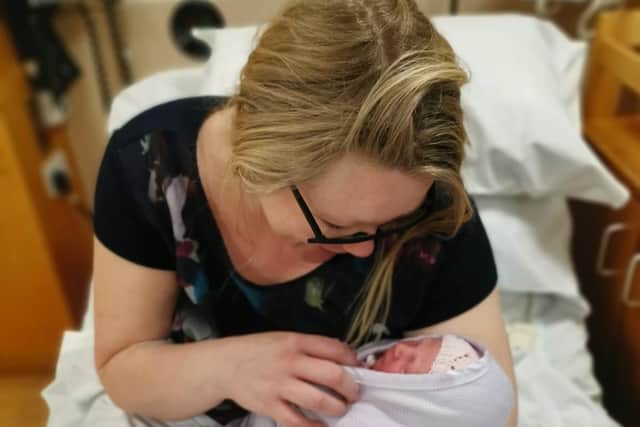 Nurse Emma Hindmarsh with her baby girl as they recovered from her surprise delivery at Sunderland Royal Hospital.