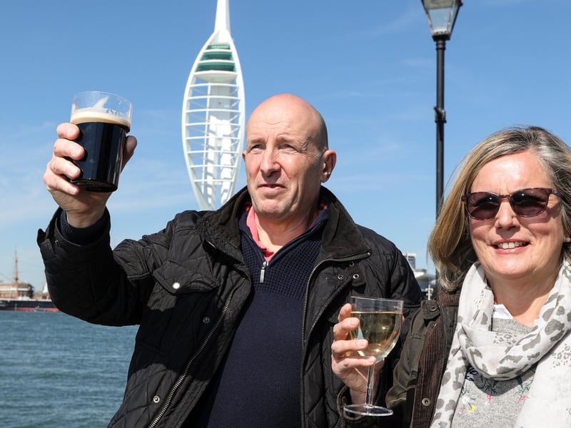 Gary and Shereen Priestley toast Prince Philip. A minute's silence in Bath Square, Old Portsmouth, for the Duke of Edinburgh at the start of his funeral
Picture: Chris Moorhouse (170421-48)
