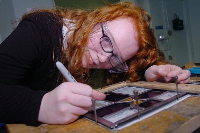 Year 9 pupil from Venerable Bede school, Rosie Jones working on a stained glass window as part of Benedict Biscop Day at The National Glass Centre in 2012.