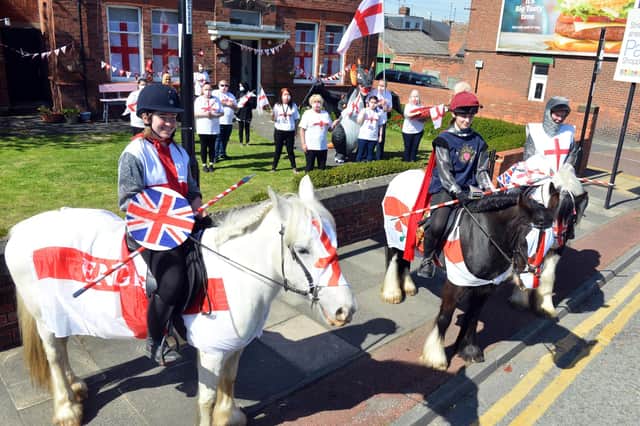 The Park Trust head off through Pallion to mark St George's Day.