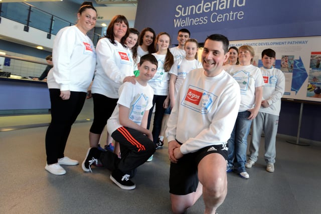 Steve Snowball, front, manager of the Sunderland City Centre Argos store, with members of the team which was about to take part in a swimathon at the Aquatic Centre to raise money for the Alzheimer's Association 9 years ago.