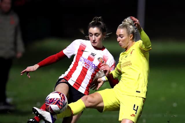 HETTON-LE-HOLE, ENGLAND - NOVEMBER 20: Rhiannon Roberts of Liverpool battles for possession with Emily Scarr of Sunderland during the Barclays FA Women's Championship match between Sunderland Ladies and Liverpool Women at Eppleton Colliery Welfare Ground on November 20, 2021 in Hetton-le-Hole, England. (Photo by Liverpool FC/Liverpool FC via Getty Images)
