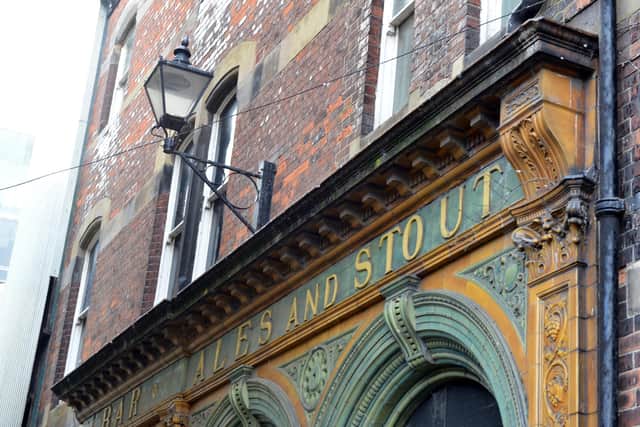 The historic pub facade in Pann Lane