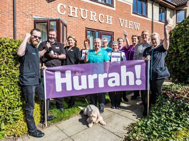 Church View celebrating after CQC report