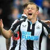 Ryan Fraser celebrates scoring his first Newcastle United goal of the season (Photo by LINDSEY PARNABY/AFP via Getty Images)