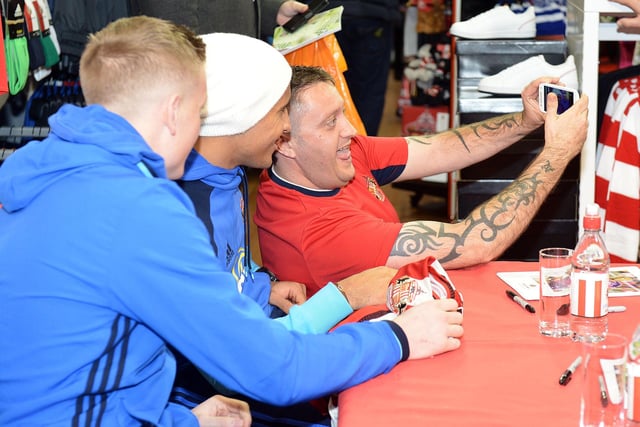 SAFC stars Jordan Pickford and Wahbi Khazri pose for a selfie during a signing session in the Galleries, Washington, 8 years ago.