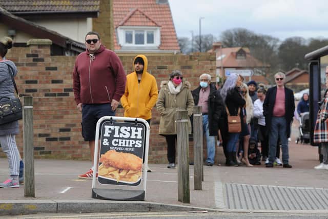 People queue for fish and chips on Good Friday in Sunderland