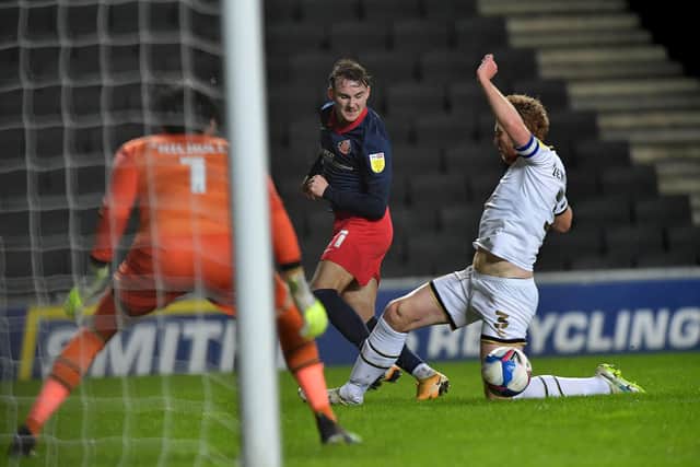 Sunderland came through a tough test at MK Dons to book a place in the Papa John's Trophy semi-final