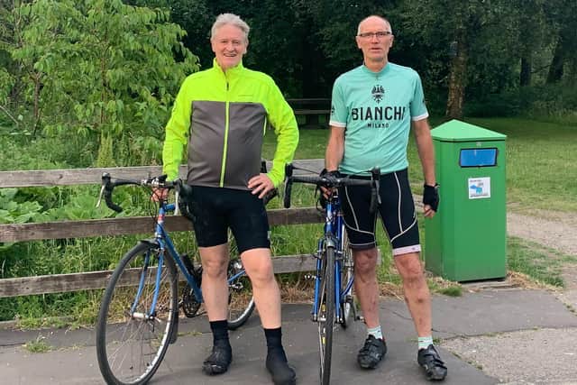 They did it. Former Sunderland AFC striker Wayne Entwistle, right and friend Matt Holt have completed their 200 mile bike ride for charity.