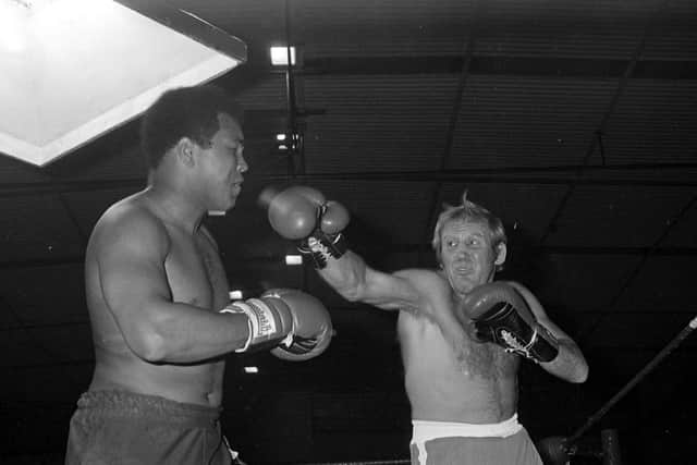 British Champion Richard Dunn taking on Muhammad Ali in Washington.