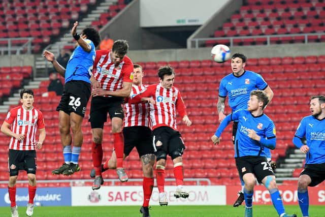 Charlie Wyke scores a crucial goal at the Stadium of Light